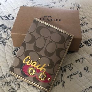 Coach Gold Passport Case